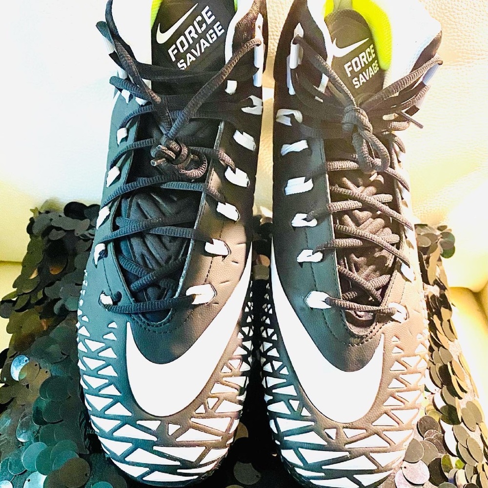NEW NEVER WORN.  Nike men’s football cleats.